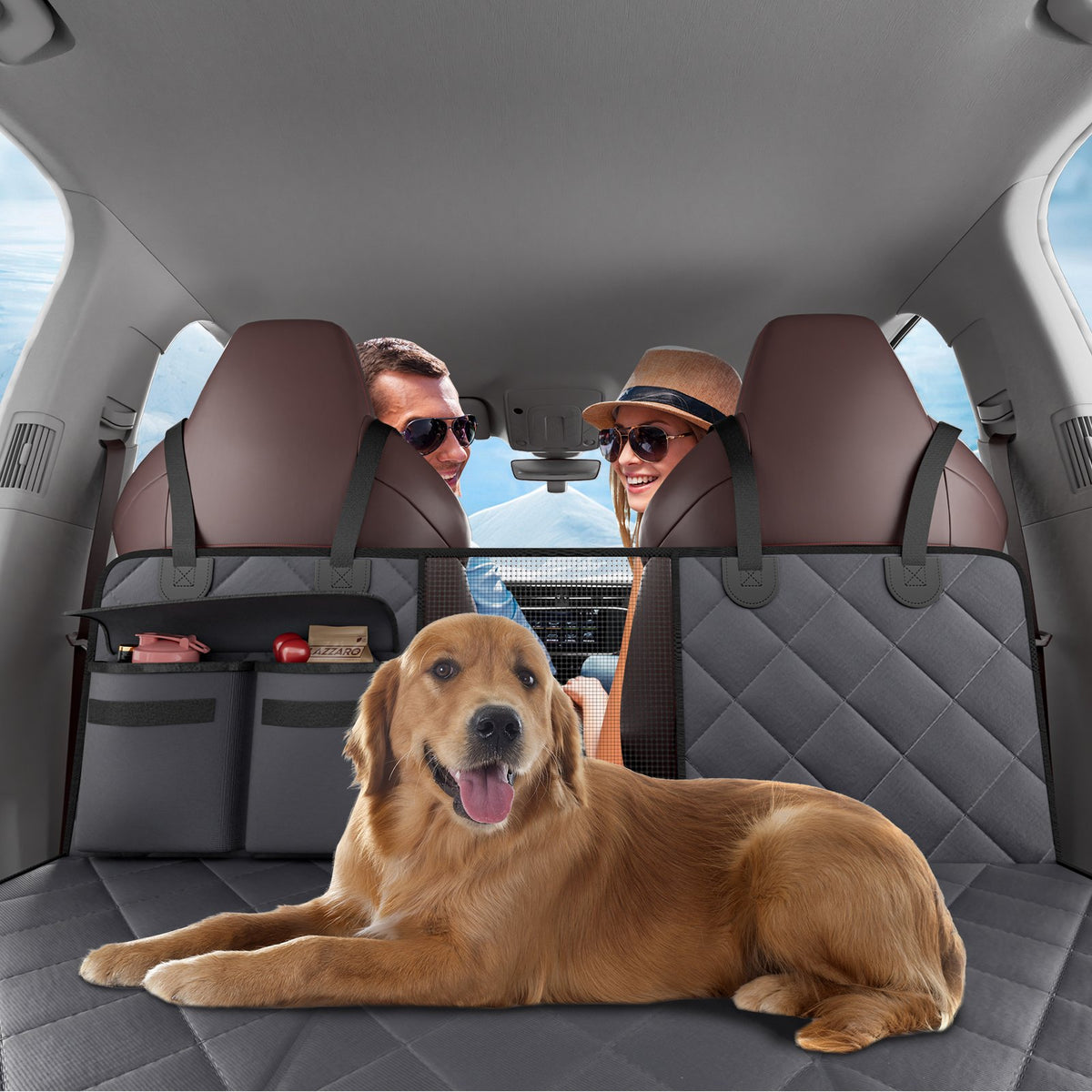 Golden retriever lying on the Backseat Hammock in the back of a car