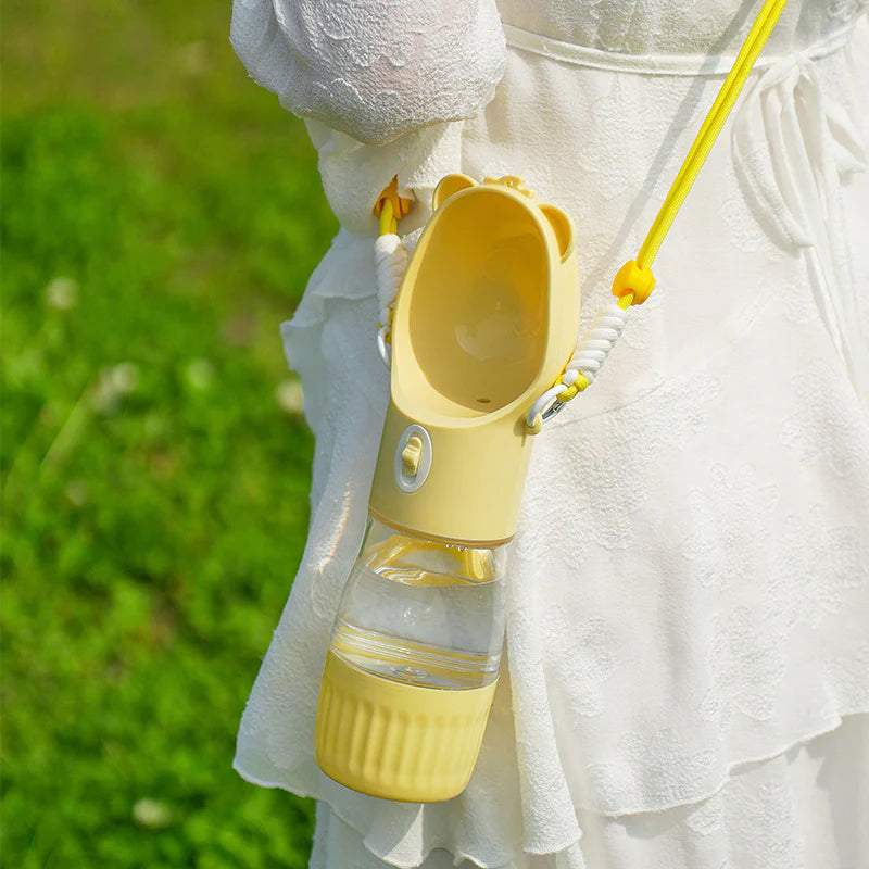 Trail Sip bottle worn crossbody on its strap